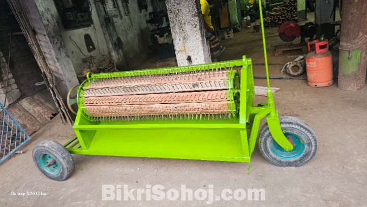 ধান মাড়াই করা মেশিন